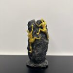 2 Persons Climbing on a Mountain