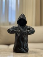 Resin man with crossed arms