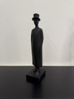 Modern Resin Man Sculpture with Cap - Image 2