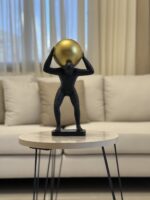 Resin Man with Golden Sphere - Image 2