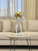 Resin Man with Golden Sphere - Image 3