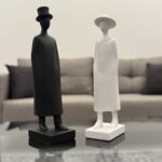 Modern Resin Woman Sculpture with Cap - Image 3